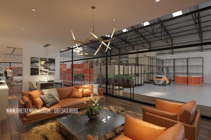 Trang trí khu vực tiếp khách showroom nổi bật, bên cạnh là khu vực trưng bày sản phẩm để khách hàng tham khảo kết hợp khu vực kho bãi rộng tạo nên một không gian nội thất lí lượng