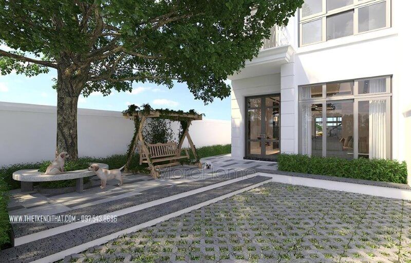 Sân vườn đơn giản nhưng mang lại cảm giác thư thái từ ghế xích đu gỗ, bóng mát sân vườn trong thiết kế ngoại cảnh biệt thự, nhà phố.